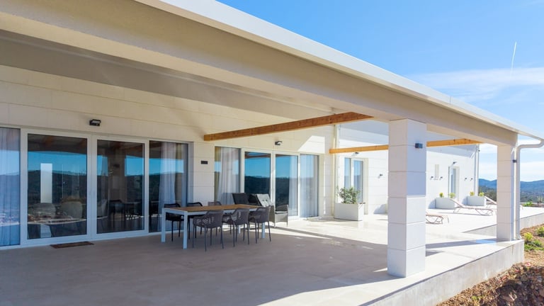 Modern house exterior with covered patio