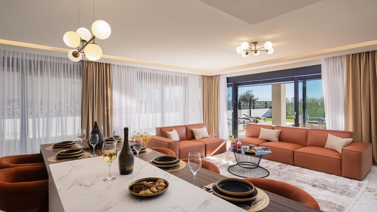 Modern luxury apartment interior with terracotta sofa, marble dining table, and floor-to-ceiling windows overlooking a city view