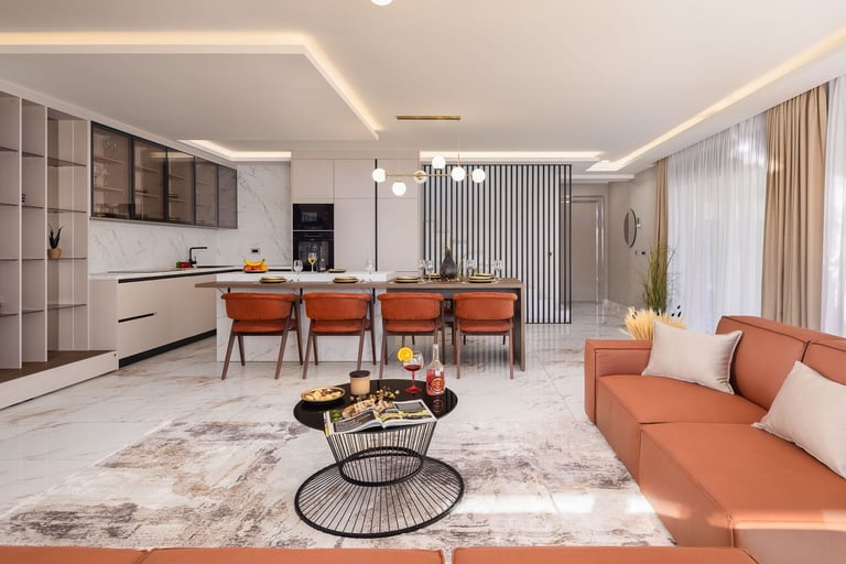 Modern open-concept apartment with orange sofa, dining chairs, minimalist kitchen, and elegant geometric decor throughout the space