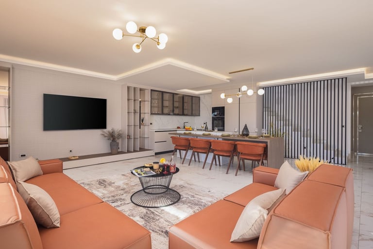 Modern open-plan living room with orange sectional sofa, mounted TV, kitchen area with orange chairs, and contemporary lighting fixtures